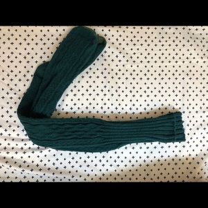 Thigh high knitted socks.